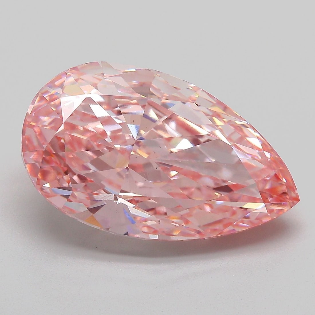Loose Diamond - PEAR 10.09ct Fancy Vivid Pink VS1: Loose Diamond - PEAR 10.09ct Fancy Vivid Pink VS1 Source: This is a real non-mined Diamond that has been grown in a lab Shape: PEAR Carats: 10.09 Color: Fancy Vivid Pink Certification: IGI Video:
