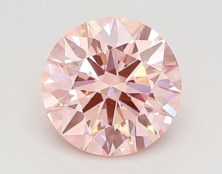 Loose Diamond - ROUND 0.69ct Fancy Vivid Pink VS1: Loose Diamond - ROUND 0.69ct Fancy Vivid Pink VS1 Source: This is a real non-mined Diamond that has been grown in a lab Shape: ROUND Carats: 0.69 Color: Fancy Vivid Pink Certification: IGI Video: