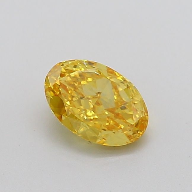 Loose Diamond - OVAL 1.02ct Fancy Vivid Yellow VS2: Loose Diamond - OVAL 1.02ct Fancy Vivid Yellow VS2 Source: This is a real non-mined Diamond that has been grown in a lab Shape: OVAL Carats: 1.02 Color: Fancy Vivid Yellow Certification: IGI Video: