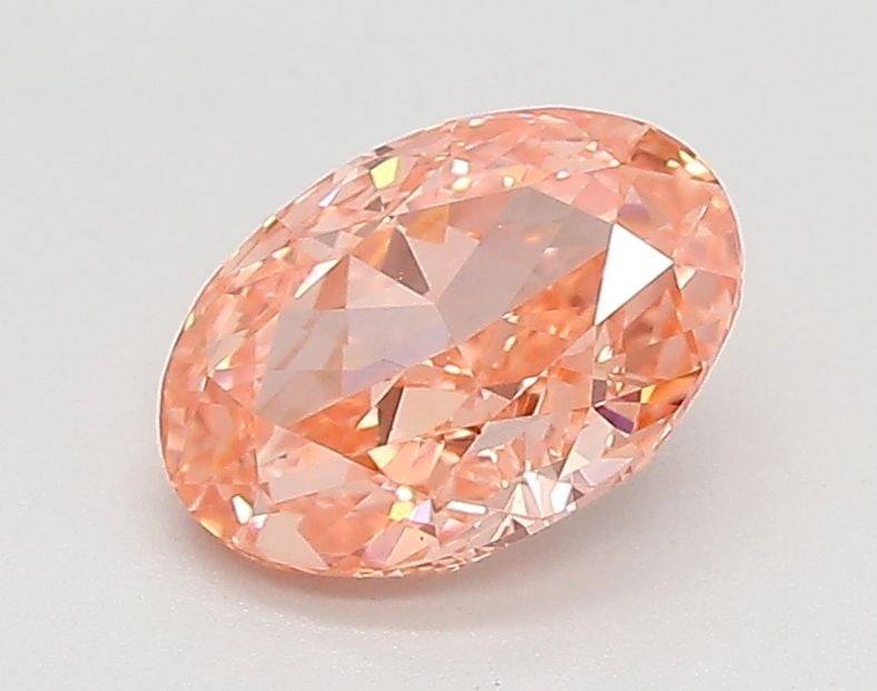 Loose Diamond - OVAL 0.89ct Fancy Vivid Pink VVS2: Loose Diamond - OVAL 0.89ct Fancy Vivid Pink VVS2 Source: This is a real non-mined Diamond that has been grown in a lab Shape: OVAL Carats: 0.89 Color: Fancy Vivid Pink Certification: IGI Video: