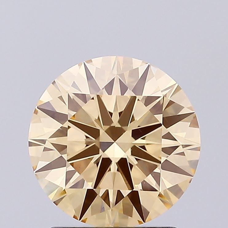 Loose Diamond - ROUND 1.52ct Fancy Brownish Yellow VVS2: Loose Diamond - ROUND 1.52ct Fancy Brownish Yellow VVS2 Source: This is a real non-mined Diamond that has been grown in a lab Shape: ROUND Carats: 1.52 Color: Fancy Brownish Yellow Certification: IGI 
