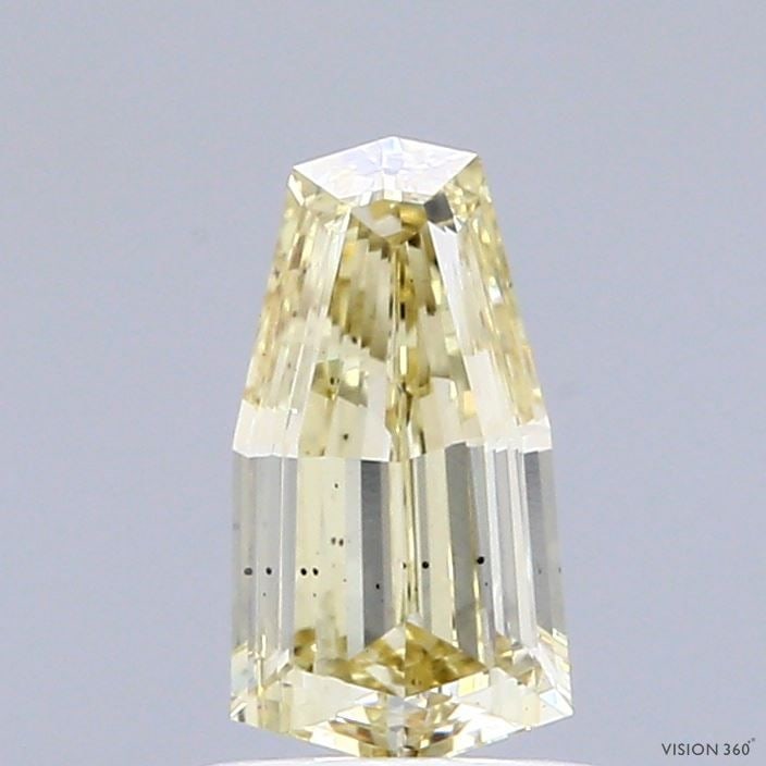 Loose Diamond - SHIELD 0.98ct Y-Z SI1: Loose Diamond - SHIELD 0.98ct Y-Z SI1 Source: This is a real non-mined Diamond that has been grown in a lab Shape: SHIELD Carats: 0.98 Color: Y-Z Certification: IGI Video: