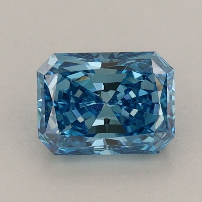 Loose Diamond - RADIANT 0.91ct Fancy Vivid Blue VVS2: Loose Diamond - RADIANT 0.91ct Fancy Vivid Blue VVS2 Source: This is a real non-mined Diamond that has been grown in a lab Shape: RADIANT Carats: 0.91 Color: Fancy Vivid Blue Certification: IGI Video: