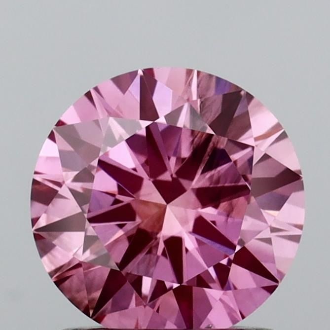 Loose Diamond - ROUND 1.07ct Fancy Vivid Pink SI1: Loose Diamond - ROUND 1.07ct Fancy Vivid Pink SI1 Source: This is a real non-mined Diamond that has been grown in a lab Shape: ROUND Carats: 1.07 Color: Fancy Vivid Pink Certification: IGI Video: