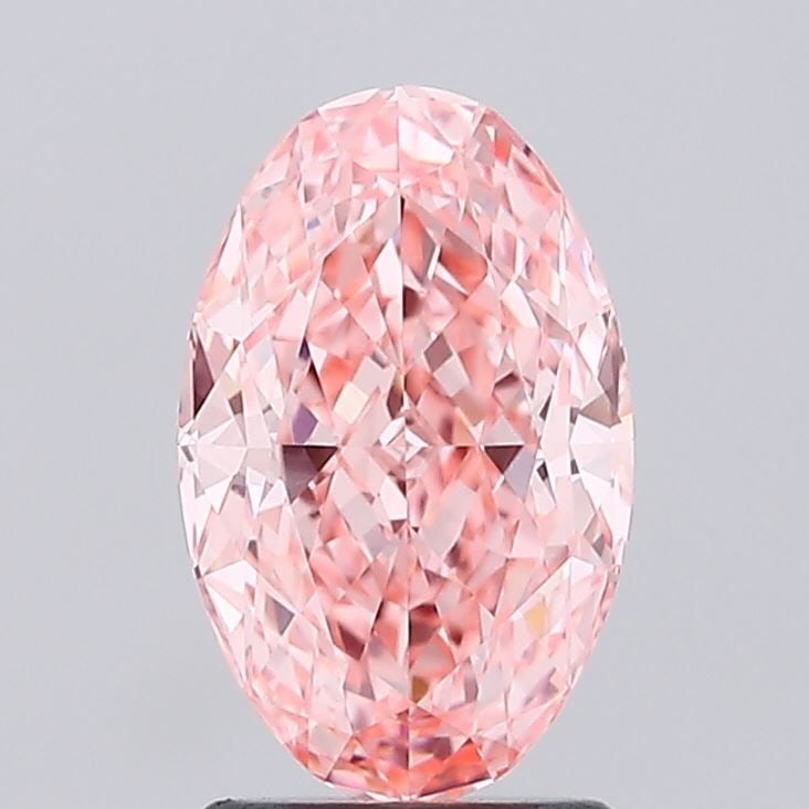 Loose Diamond - OVAL 2.14ct Fancy Vivid Pink VVS2: Loose Diamond - OVAL 2.14ct Fancy Vivid Pink VVS2 Source: This is a real non-mined Diamond that has been grown in a lab Shape: OVAL Carats: 2.14 Color: Fancy Vivid Pink Certification: IGI Video: