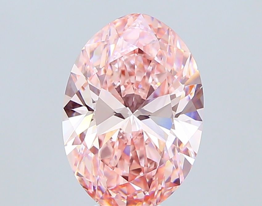 Loose Diamond - OVAL 6.01ct Fancy Vivid Pink VVS2: Loose Diamond - OVAL 6.01ct Fancy Vivid Pink VVS2 Source: This is a real non-mined Diamond that has been grown in a lab Shape: OVAL Carats: 6.01 Color: Fancy Vivid Pink Certification: IGI Additional i