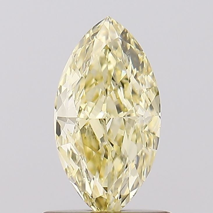 Loose Diamond - MARQUISE 1.01ct Fancy Yellow VVS2: Loose Diamond - MARQUISE 1.01ct Fancy Yellow VVS2 Source: This is a real non-mined Diamond that has been grown in a lab Shape: MARQUISE Carats: 1.01 Color: Fancy Yellow Certification: IGI Video: