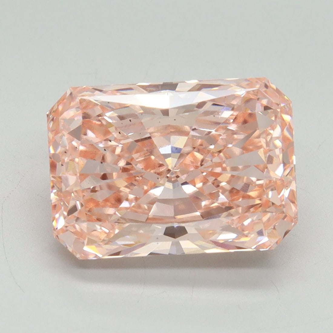 Loose Diamond - RADIANT 5.18ct Fancy Vivid Pink VS2: Loose Diamond - RADIANT 5.18ct Fancy Vivid Pink VS2 Source: This is a real non-mined Diamond that has been grown in a lab Shape: RADIANT Carats: 5.18 Color: Fancy Vivid Pink Certification: IGI Video: