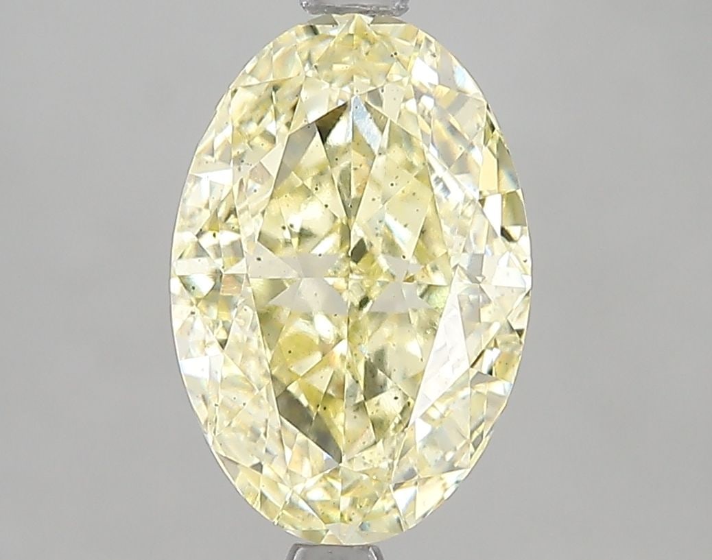 Loose Diamond - OVAL 3.04ct Fancy Intense Yellow SI1: Loose Diamond - OVAL 3.04ct Fancy Intense Yellow SI1 Source: This is a real non-mined Diamond that has been grown in a lab Shape: OVAL Carats: 3.04 Color: Fancy Intense Yellow Certification: IGI Video