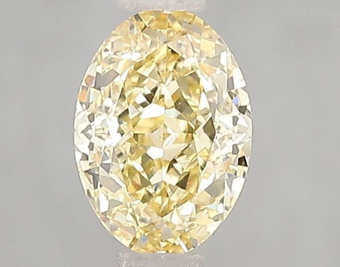 Loose Diamond - OVAL 1.0ct Fancy Intense Yellow VVS2: Loose Diamond - OVAL 1.0ct Fancy Intense Yellow VVS2 Source: This is a real non-mined Diamond that has been grown in a lab Shape: OVAL Carats: 1.0 Color: Fancy Intense Yellow Certification: IGI Video: