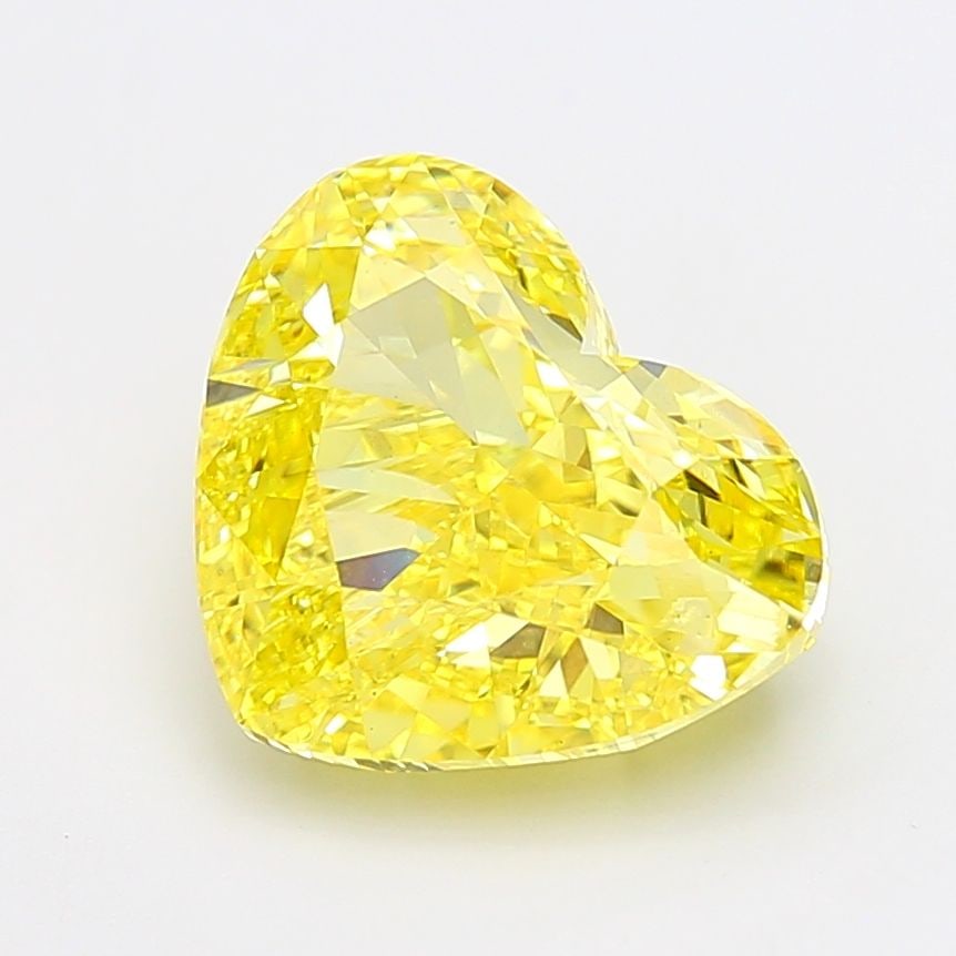Loose Diamond - HEART 7.11ct Fancy Vivid Yellow VS1: Loose Diamond - HEART 7.11ct Fancy Vivid Yellow VS1 Source: This is a real non-mined Diamond that has been grown in a lab Shape: HEART Carats: 7.11 Color: Fancy Vivid Yellow Certification: IGI Video: