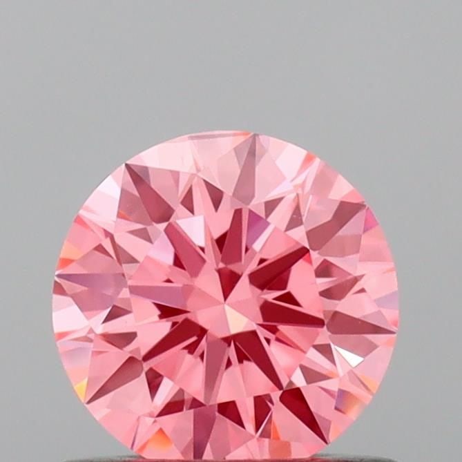 Loose Diamond - ROUND 0.61ct Fancy Vivid Pink VS1: Loose Diamond - ROUND 0.61ct Fancy Vivid Pink VS1 Source: This is a real non-mined Diamond that has been grown in a lab Shape: ROUND Carats: 0.61 Color: Fancy Vivid Pink Certification: IGI Video: