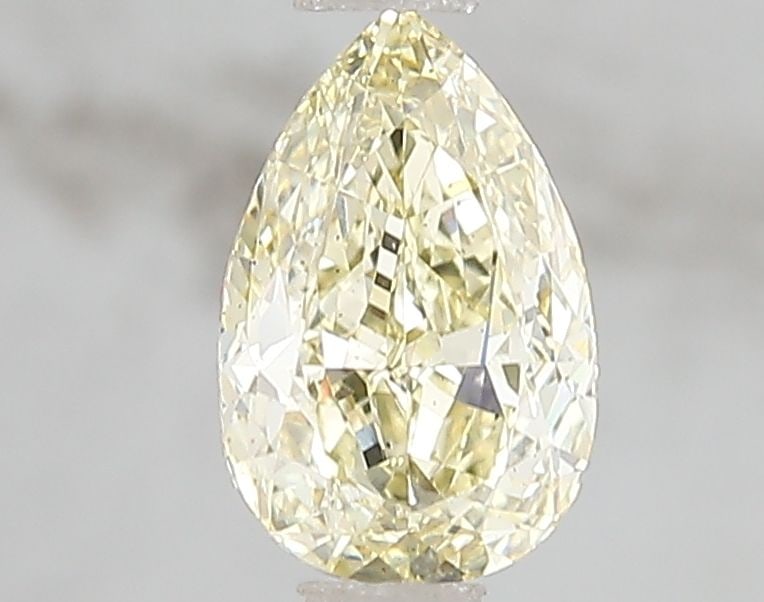 Loose Diamond - PEAR 1.07ct Fancy Yellow VS2: Loose Diamond - PEAR 1.07ct Fancy Yellow VS2 Source: This is a real non-mined Diamond that has been grown in a lab Shape: PEAR Carats: 1.07 Color: Fancy Yellow Certification: IGI Video: