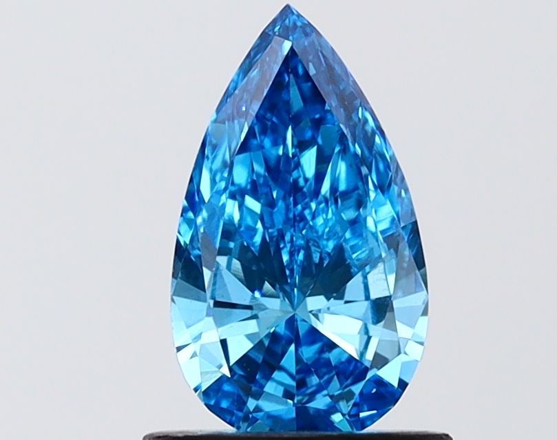 Loose Diamond - PEAR 0.99ct Fancy Vivid Blue VS1: Loose Diamond - PEAR 0.99ct Fancy Vivid Blue VS1 Source: This is a real non-mined Diamond that has been grown in a lab Shape: PEAR Carats: 0.99 Color: Fancy Vivid Blue Certification: IGI Video: