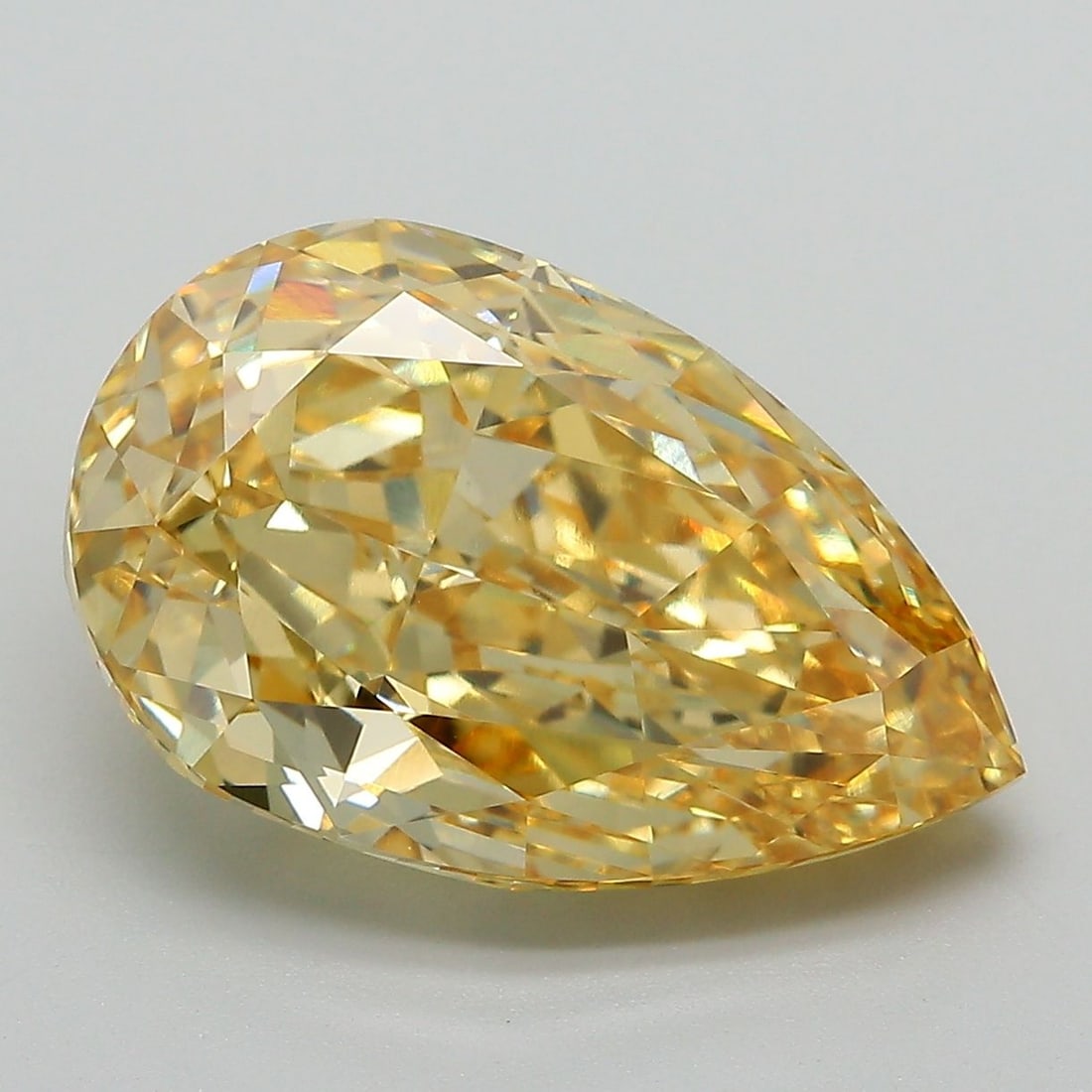Loose Diamond - PEAR 7.03ct Fancy Vivid Yellow VVS2: Loose Diamond - PEAR 7.03ct Fancy Vivid Yellow VVS2 Source: This is a real non-mined Diamond that has been grown in a lab Shape: PEAR Carats: 7.03 Color: Fancy Vivid Yellow Certification: IGI Video: