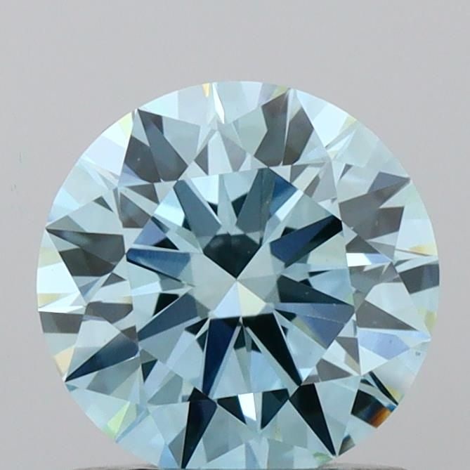 Ideal Loose Diamond - ROUND 0.91ct Fancy Vivid Blue VS1: Ideal Loose Diamond - ROUND 0.91ct Fancy Vivid Blue VS1 Source: This is a real non-mined Diamond that has been grown in a lab Shape: ROUND Carats: 0.91 Color: Fancy Vivid Blue Certification: IGI Video
