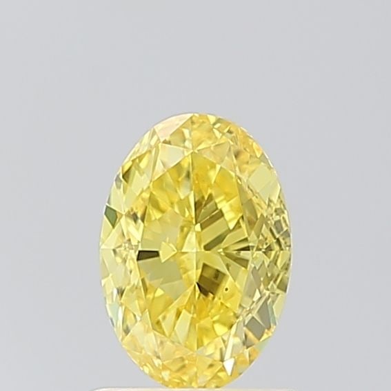 Loose Diamond - OVAL 1.05ct Fancy Vivid Yellow VS1: Loose Diamond - OVAL 1.05ct Fancy Vivid Yellow VS1 Source: This is a real non-mined Diamond that has been grown in a lab Shape: OVAL Carats: 1.05 Color: Fancy Vivid Yellow Certification: IGI Video: