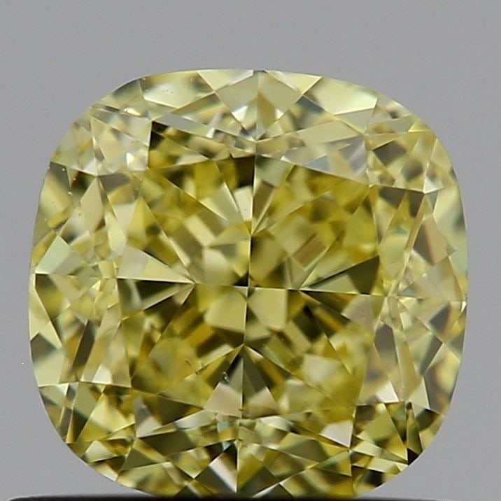Loose Diamond - CUSHION MODIFIED 0.7ct Fancy Yellow VS2: Loose Diamond - CUSHION MODIFIED 0.7ct Fancy Yellow VS2 Source: This is a real non-mined Diamond that has been grown in a lab Shape: CUSHION MODIFIED Carats: 0.7 Color: Fancy Yellow Certification: IGI