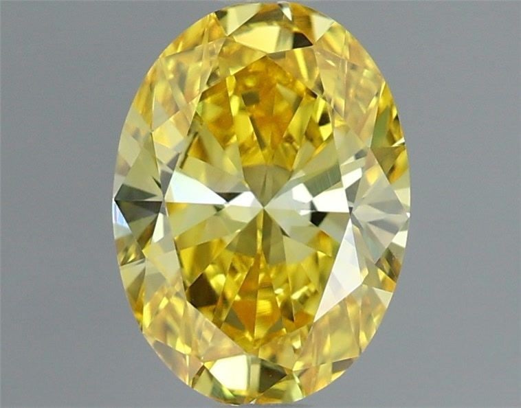 Loose Diamond - OVAL 1.07ct Fancy Vivid Yellow VS1: Loose Diamond - OVAL 1.07ct Fancy Vivid Yellow VS1 Source: This is a real non-mined Diamond that has been grown in a lab Shape: OVAL Carats: 1.07 Color: Fancy Vivid Yellow Certification: IGI Additiona