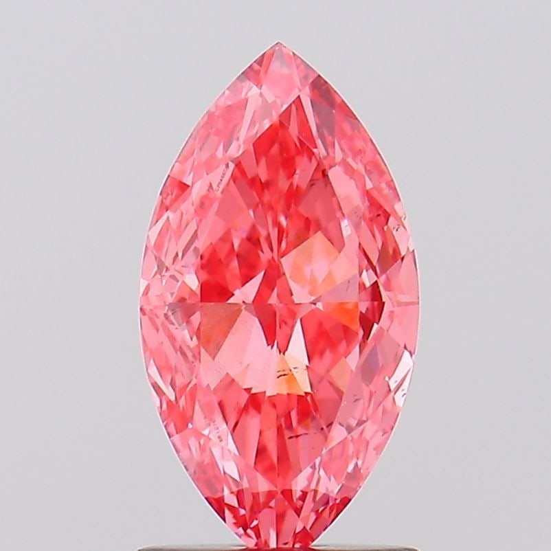 Loose Diamond - MARQUISE 1.53ct Fancy Vivid Pink VS2: Loose Diamond - MARQUISE 1.53ct Fancy Vivid Pink VS2 Source: This is a real non-mined Diamond that has been grown in a lab Shape: MARQUISE Carats: 1.53 Color: Fancy Vivid Pink Certification: IGI Video