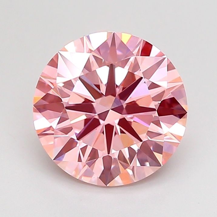Ideal Loose Diamond - ROUND 2.26ct Fancy Vivid Pink VS2: Ideal Loose Diamond - ROUND 2.26ct Fancy Vivid Pink VS2 Source: This is a real non-mined Diamond that has been grown in a lab Shape: ROUND Carats: 2.26 Color: Fancy Vivid Pink Certification: IGI Video
