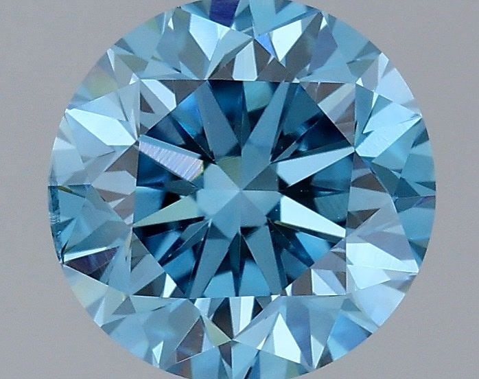 Loose Diamond - ROUND 1.7ct Fancy Vivid Blue SI1: Loose Diamond - ROUND 1.7ct Fancy Vivid Blue SI1 Source: This is a real non-mined Diamond that has been grown in a lab Shape: ROUND Carats: 1.7 Color: Fancy Vivid Blue Certification: IGI Video: