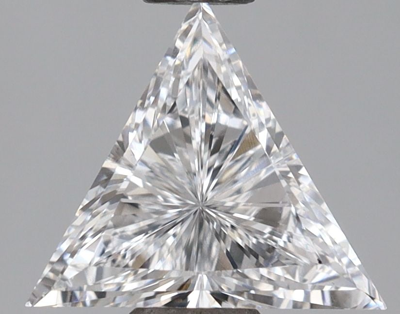 Loose Diamond - TRIANGULAR 0.78ct E VVS1: Loose Diamond - TRIANGULAR 0.78ct E VVS1 Source: This is a real non-mined Diamond that has been grown in a lab Shape: TRIANGULAR Carats: 0.78 Color: E Clarity: VVS1 Certification: IGI Video: