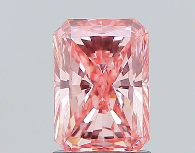 Loose Diamond - RADIANT 1.54ct Fancy Vivid Pink VS2: Loose Diamond - RADIANT 1.54ct Fancy Vivid Pink VS2 Source: This is a real non-mined Diamond that has been grown in a lab Shape: RADIANT Carats: 1.54 Color: Fancy Vivid Pink Certification: IGI Video: