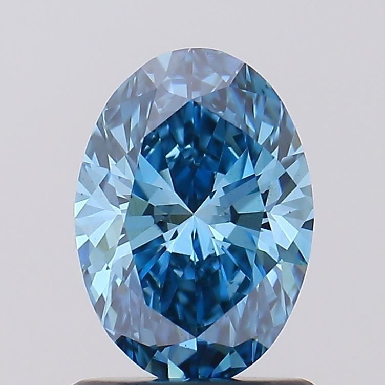 Loose Diamond - OVAL 1.05ct Fancy Vivid Blue VS1: Loose Diamond - OVAL 1.05ct Fancy Vivid Blue VS1 Source: This is a real non-mined Diamond that has been grown in a lab Shape: OVAL Carats: 1.05 Color: Fancy Vivid Blue Certification: IGI Video: