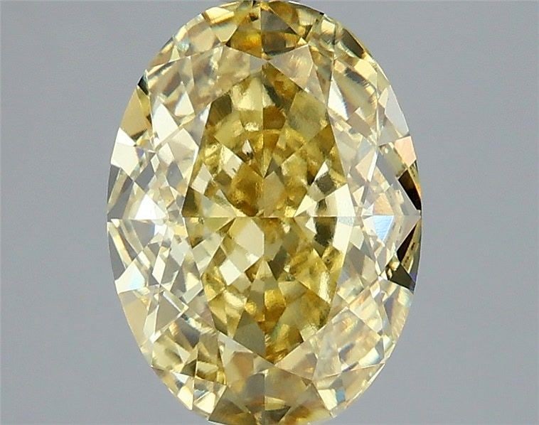 Loose Diamond - OVAL 3.01ct Fancy Intense Yellow VS1: Loose Diamond - OVAL 3.01ct Fancy Intense Yellow VS1 Source: This is a real non-mined Diamond that has been grown in a lab Shape: OVAL Carats: 3.01 Color: Fancy Intense Yellow Certification: IGI Video