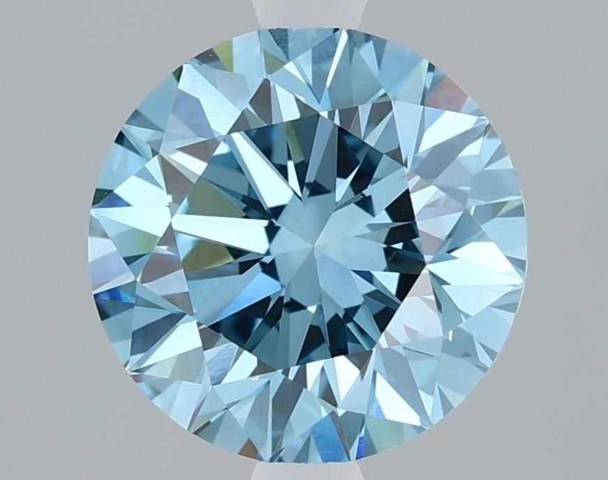 Loose Diamond - ROUND 2.13ct Fancy Vivid Blue VVS2: Loose Diamond - ROUND 2.13ct Fancy Vivid Blue VVS2 Source: This is a real non-mined Diamond that has been grown in a lab Shape: ROUND Carats: 2.13 Color: Fancy Vivid Blue Certification: IGI Video: