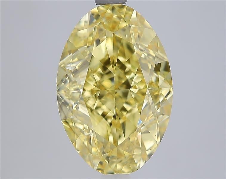Loose Diamond - OVAL 5.07ct Fancy Vivid Yellow VS2: Loose Diamond - OVAL 5.07ct Fancy Vivid Yellow VS2 Source: This is a real non-mined Diamond that has been grown in a lab Shape: OVAL Carats: 5.07 Color: Fancy Vivid Yellow Certification: IGI Video:
