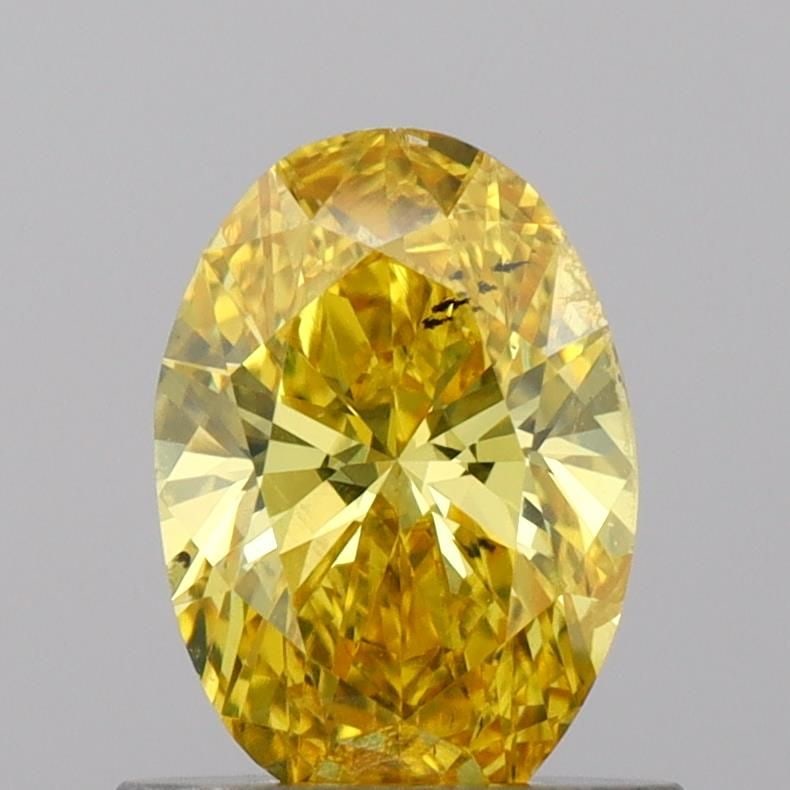 Loose Diamond - OVAL 0.76ct Fancy Vivid Yellow VS2: Loose Diamond - OVAL 0.76ct Fancy Vivid Yellow VS2 Source: This is a real non-mined Diamond that has been grown in a lab Shape: OVAL Carats: 0.76 Color: Fancy Vivid Yellow Certification: IGI Video: