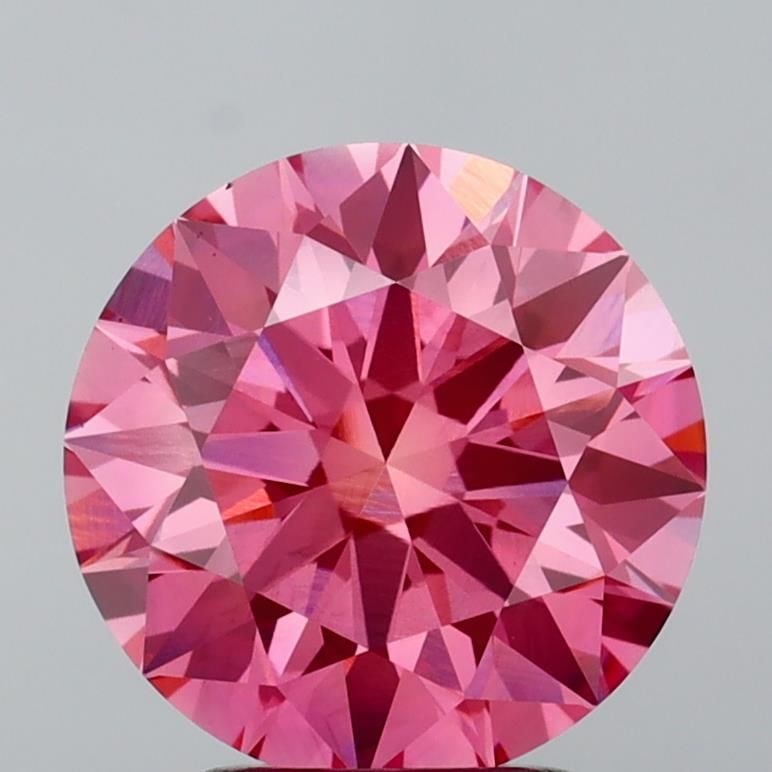 Ideal Loose Diamond - ROUND 3.06ct Fancy Vivid Pink VS1: Ideal Loose Diamond - ROUND 3.06ct Fancy Vivid Pink VS1 Source: This is a real non-mined Diamond that has been grown in a lab Shape: ROUND Carats: 3.06 Color: Fancy Vivid Pink Certification: IGI Video