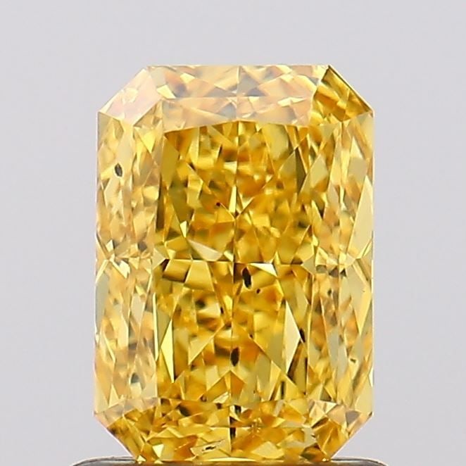 Loose Diamond - RADIANT 1.05ct Fancy Vivid Yellow SI1: Loose Diamond - RADIANT 1.05ct Fancy Vivid Yellow SI1 Source: This is a real non-mined Diamond that has been grown in a lab Shape: RADIANT Carats: 1.05 Color: Fancy Vivid Yellow Certification: IGI Vid