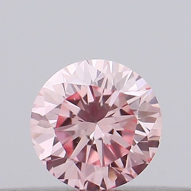 Loose Diamond - ROUND 0.16ct Fancy Intense Pink VS2: Loose Diamond - ROUND 0.16ct Fancy Intense Pink VS2 Source: This is a real non-mined Diamond that has been grown in a lab Shape: ROUND Carats: 0.16 Color: Fancy Intense Pink Certification: IGI Video: