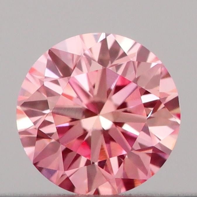 Loose Diamond - ROUND 0.19ct Fancy Vivid Pink VVS2: Loose Diamond - ROUND 0.19ct Fancy Vivid Pink VVS2 Source: This is a real non-mined Diamond that has been grown in a lab Shape: ROUND Carats: 0.19 Color: Fancy Vivid Pink Certification: IGI Video:
