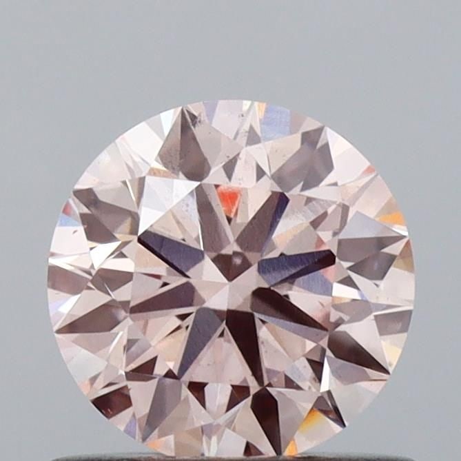 Ideal Loose Diamond - ROUND 0.71ct Fancy Pink VS2: Ideal Loose Diamond - ROUND 0.71ct Fancy Pink VS2 Source: This is a real non-mined Diamond that has been grown in a lab Shape: ROUND Carats: 0.71 Color: Fancy Pink Certification: IGI Video: