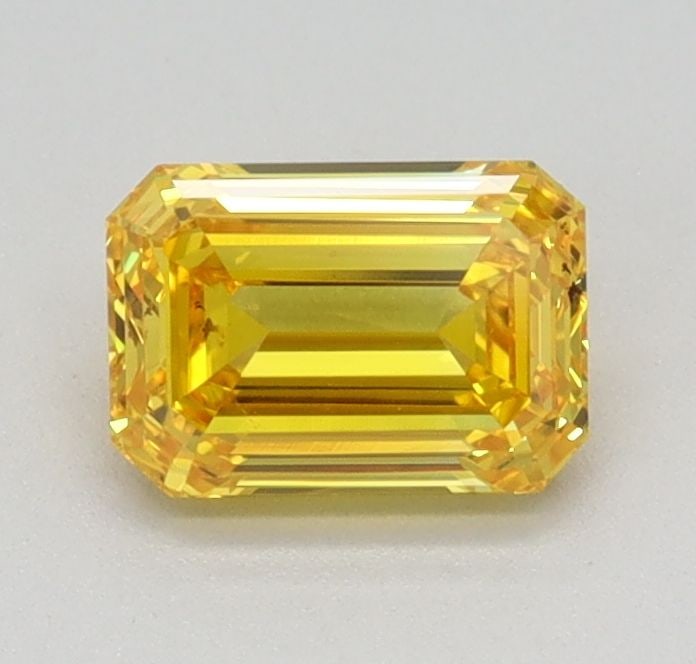 Loose Diamond - EMERALD 0.57ct Fancy Vivid Yellow VS1: Loose Diamond - EMERALD 0.57ct Fancy Vivid Yellow VS1 Source: This is a real non-mined Diamond that has been grown in a lab Shape: EMERALD Carats: 0.57 Color: Fancy Vivid Yellow Certification: IGI Vid