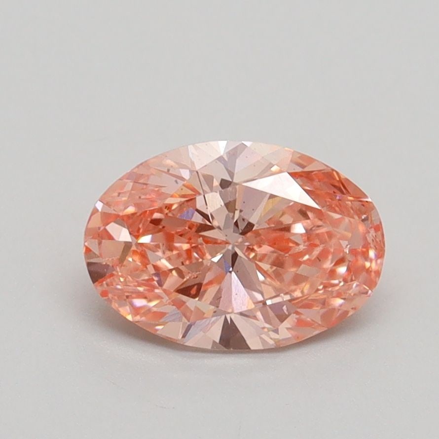 Loose Diamond - OVAL 1.04ct Fancy Vivid Pink SI2: Loose Diamond - OVAL 1.04ct Fancy Vivid Pink SI2 Source: This is a real non-mined Diamond that has been grown in a lab Shape: OVAL Carats: 1.04 Color: Fancy Vivid Pink Certification: IGI Video: