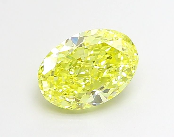Loose Diamond - OVAL 2.12ct Fancy Vivid Yellow VVS2: Loose Diamond - OVAL 2.12ct Fancy Vivid Yellow VVS2 Source: This is a real non-mined Diamond that has been grown in a lab Shape: OVAL Carats: 2.12 Color: Fancy Vivid Yellow Certification: IGI Video:
