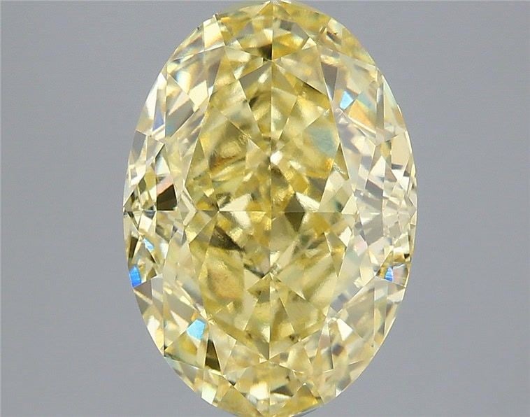 Loose Diamond - OVAL 4.26ct Fancy Yellow VS1: Loose Diamond - OVAL 4.26ct Fancy Yellow VS1 Source: This is a real non-mined Diamond that has been grown in a lab Shape: OVAL Carats: 4.26 Color: Fancy Yellow Certification: IGI Video: