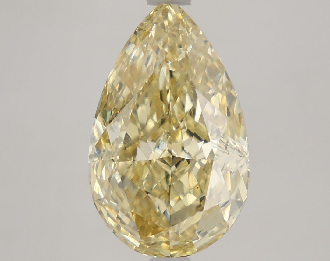 Loose Diamond - PEAR 3.94ct Fancy Intense Yellow VVS2: Loose Diamond - PEAR 3.94ct Fancy Intense Yellow VVS2 Source: This is a real non-mined Diamond that has been grown in a lab Shape: PEAR Carats: 3.94 Color: Fancy Intense Yellow Certification: IGI Vide