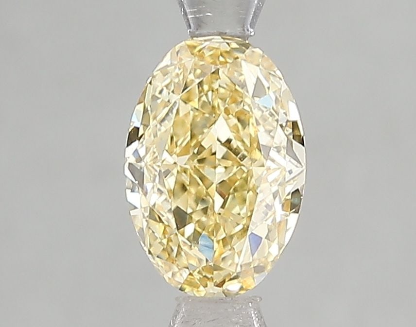 Loose Diamond - OVAL 1.1ct Fancy Intense Yellow VVS2: Loose Diamond - OVAL 1.1ct Fancy Intense Yellow VVS2 Source: This is a real non-mined Diamond that has been grown in a lab Shape: OVAL Carats: 1.1 Color: Fancy Intense Yellow Certification: IGI Video:
