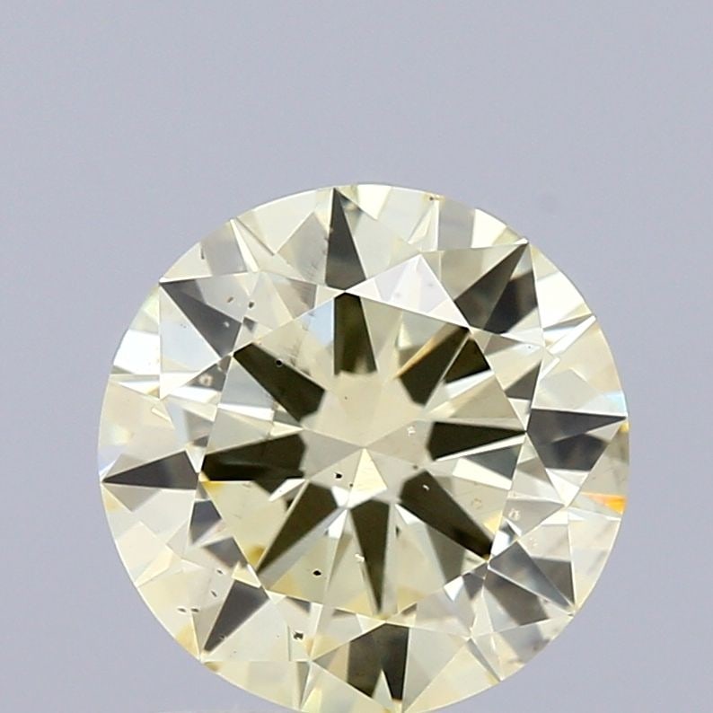 Loose Diamond - ROUND 1.5ct Fancy Light Yellow SI1: Loose Diamond - ROUND 1.5ct Fancy Light Yellow SI1 Source: This is a real non-mined Diamond that has been grown in a lab Shape: ROUND Carats: 1.5 Color: Fancy Light Yellow Certification: IGI Video: