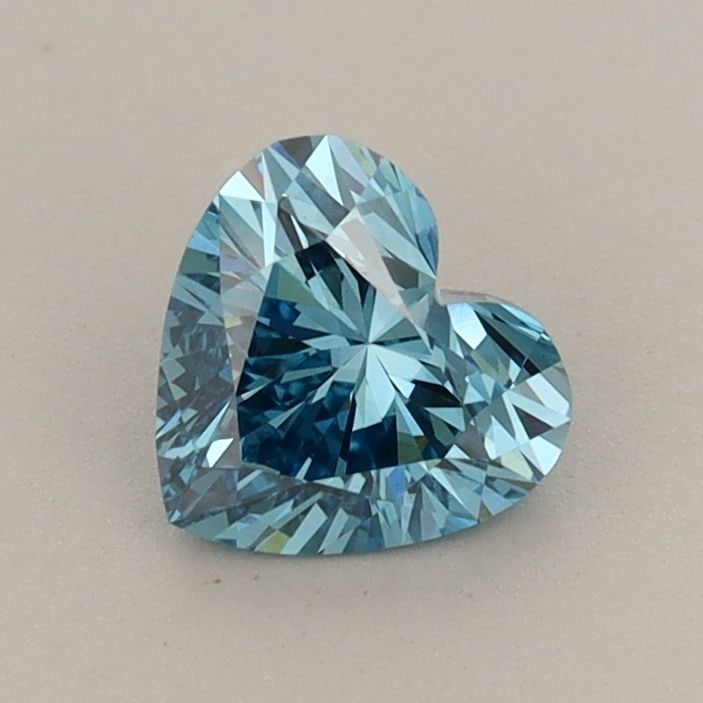 Loose Diamond - HEART 0.65ct Fancy Vivid Blue VS1: Loose Diamond - HEART 0.65ct Fancy Vivid Blue VS1 Source: This is a real non-mined Diamond that has been grown in a lab Shape: HEART Carats: 0.65 Color: Fancy Vivid Blue Certification: IGI Additional 