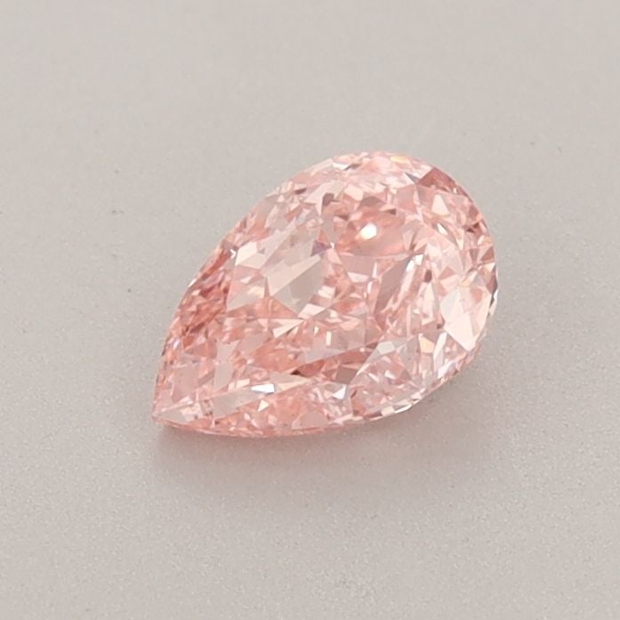 Loose Diamond - PEAR 0.6ct Fancy Vivid Pink VS2: Loose Diamond - PEAR 0.6ct Fancy Vivid Pink VS2 Source: This is a real non-mined Diamond that has been grown in a lab Shape: PEAR Carats: 0.6 Color: Fancy Vivid Pink Certification: IGI Video: