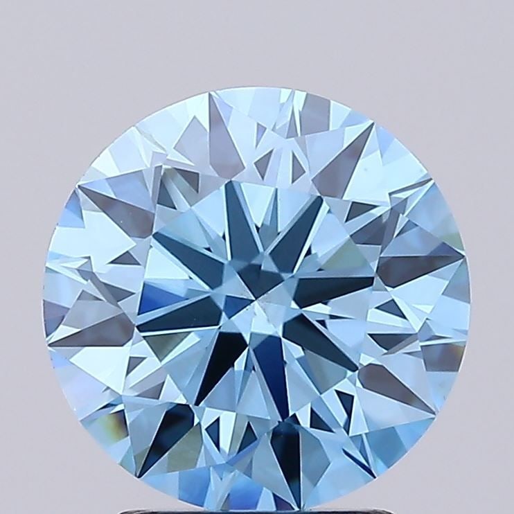 Ideal Loose Diamond - ROUND 2.77ct Fancy Vivid Blue VS1: Ideal Loose Diamond - ROUND 2.77ct Fancy Vivid Blue VS1 Source: This is a real non-mined Diamond that has been grown in a lab Shape: ROUND Carats: 2.77 Color: Fancy Vivid Blue Certification: IGI Video