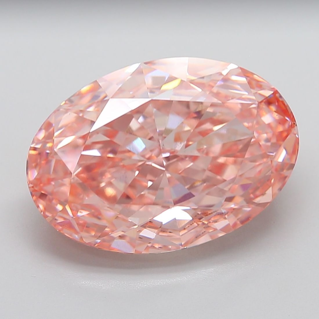 Loose Diamond - OVAL 20.07ct Fancy Vivid Pink VS1: Loose Diamond - OVAL 20.07ct Fancy Vivid Pink VS1 Source: This is a real non-mined Diamond that has been grown in a lab Shape: OVAL Carats: 20.07 Color: Fancy Vivid Pink Certification: IGI Video: