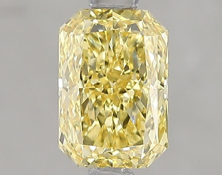 Loose Diamond - RADIANT 1.01ct Fancy Vivid Yellow VS1: Loose Diamond - RADIANT 1.01ct Fancy Vivid Yellow VS1 Source: This is a real non-mined Diamond that has been grown in a lab Shape: RADIANT Carats: 1.01 Color: Fancy Vivid Yellow Certification: IGI Vid